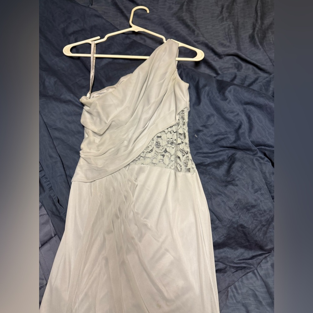 Silver one shoulder gown